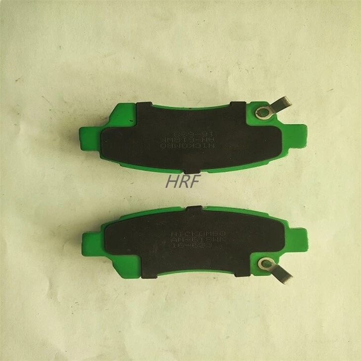 3 front of green coating brake pads